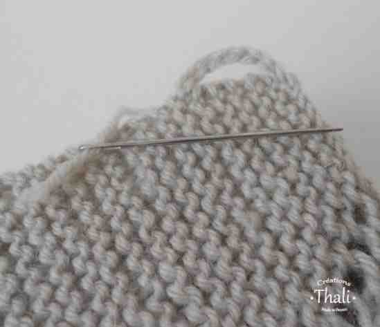 Comment faire une boutonnière sur un tricot ?